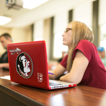 Student in front of laptop